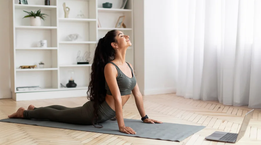 Woman doing yoga at home