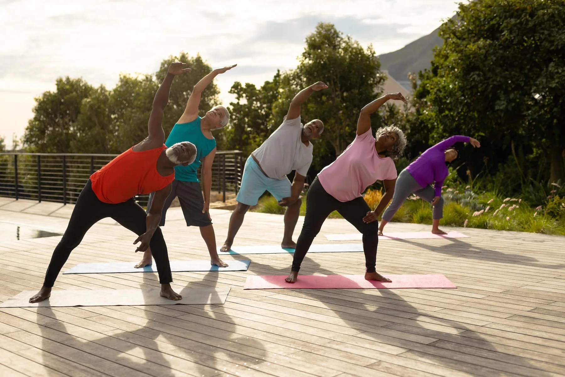 A group taking part in an outdoor yoga session